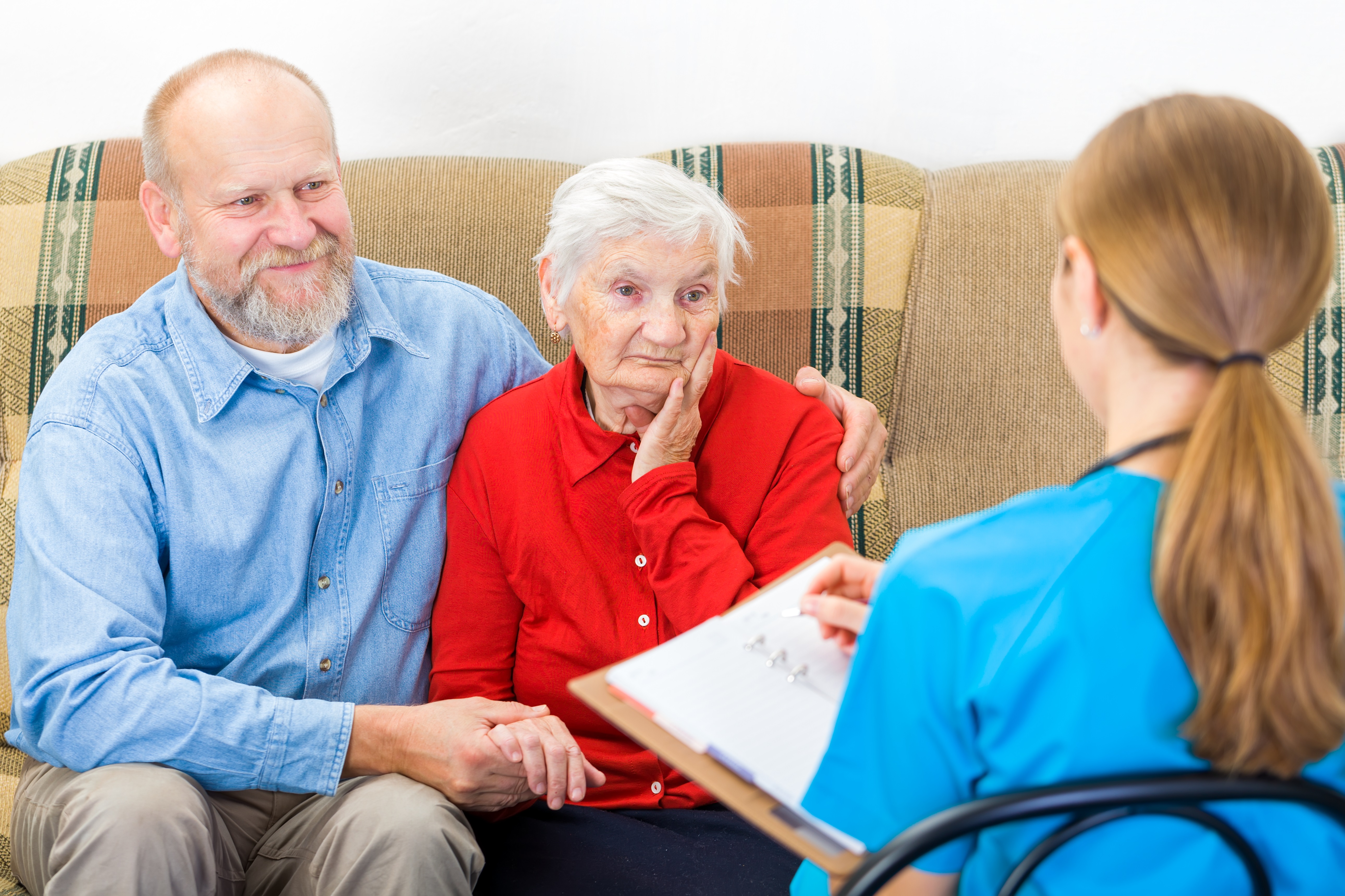 Healthcare professional discussing hospice care with family